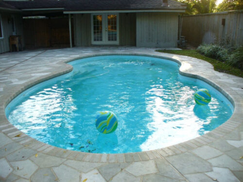 American Pools-Lazy S stamped concrete