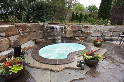 Royale Spa with stone wall and waterfall